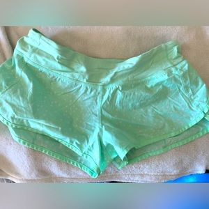 Mint green size 6 polka dot Lulu Lemon shorts with liner